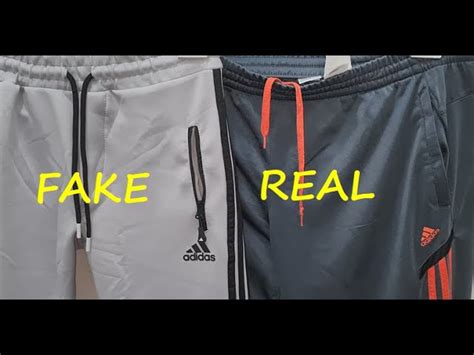 fake adidas tracksuit|how to identify adidas products.